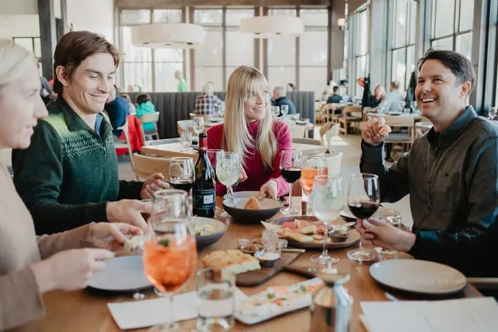 Group of friends dining out at a table