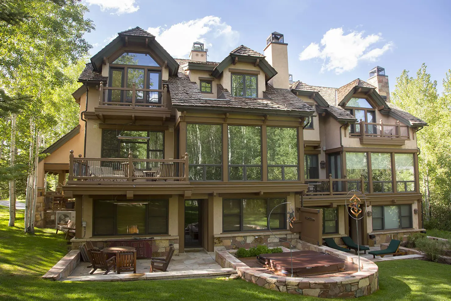 Snowmass Lodging Company exterior view in the summer