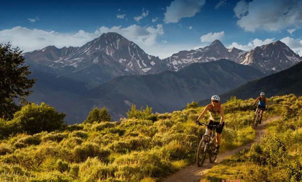 Riding bike on trail during summer