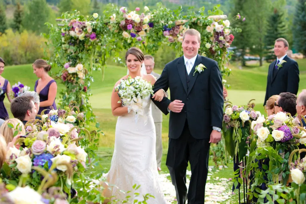 Bridge and Groom walking down aisle