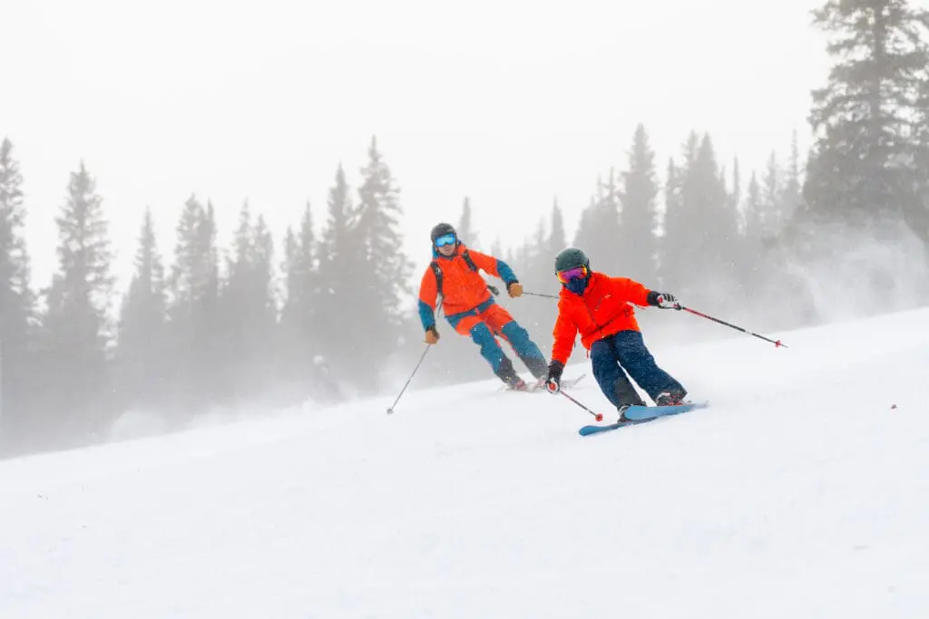 people skiing down a mountain