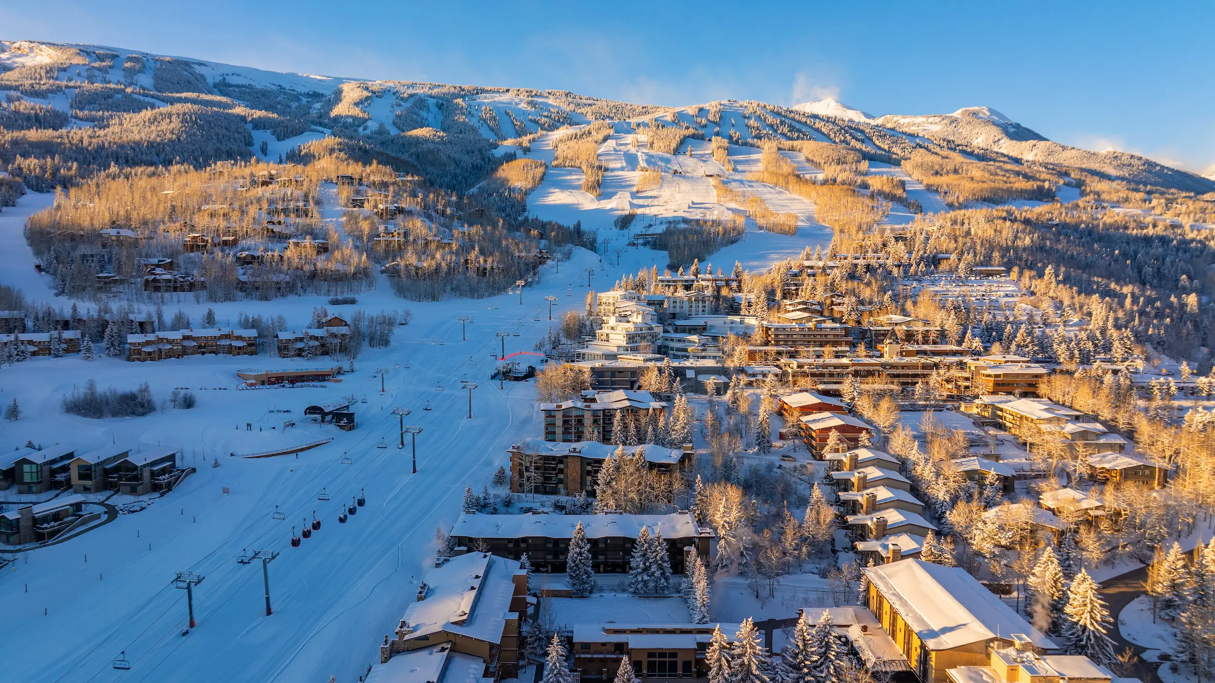 aerial view of the town of ski in ski out lodging and slopeside hotels in Snowmass