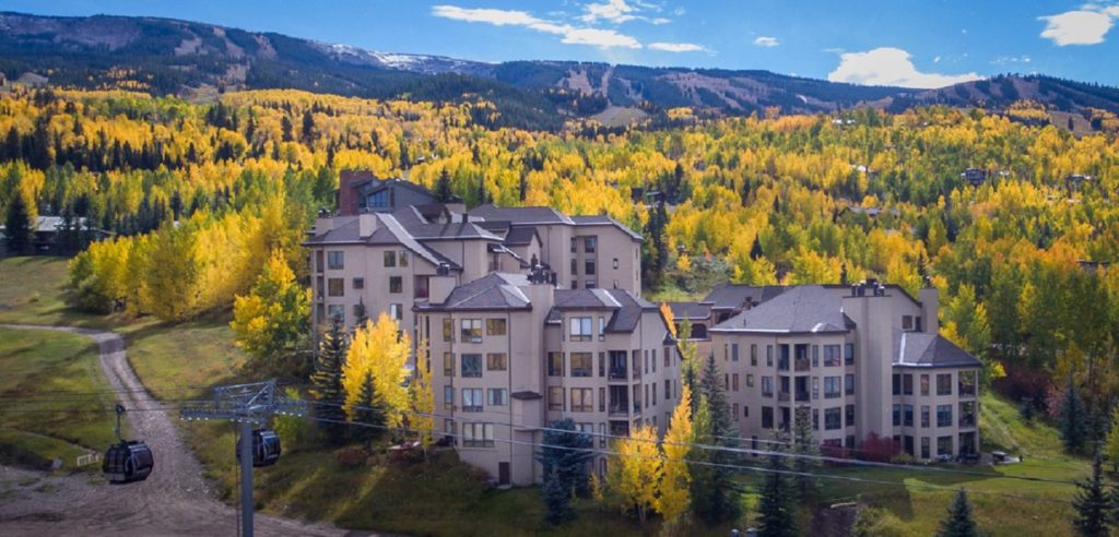 Snowmass Lodging Company distant view in the fall