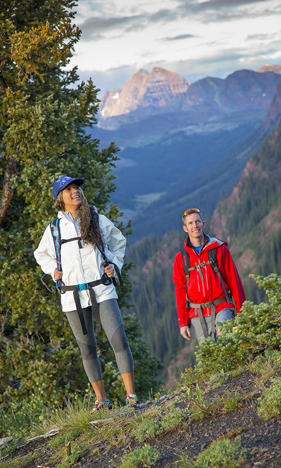 hikers with Maroon Bells in backdrop