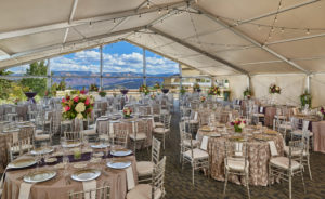 Dining tables covered by a tent outisde of Westin